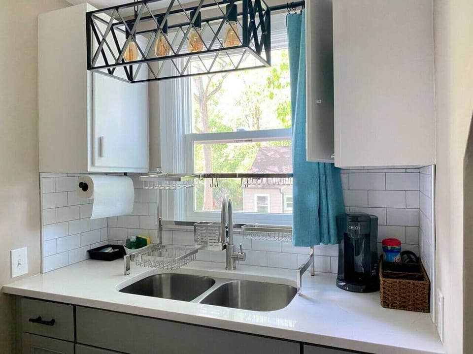 Whether you are prepping for a meal or making coffee, you get to enjoy the views of the outdoors from this kitchen