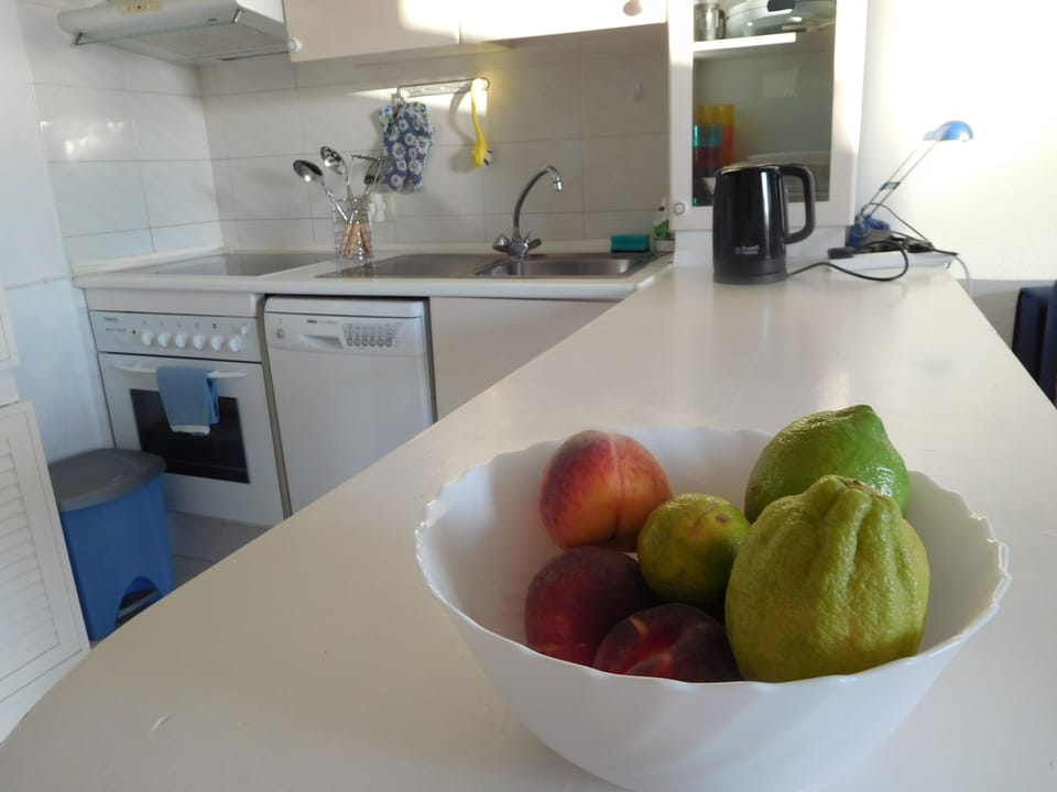 Kitchen with dishwasher, oven and Kitchen with dishwasher, oven and fridge