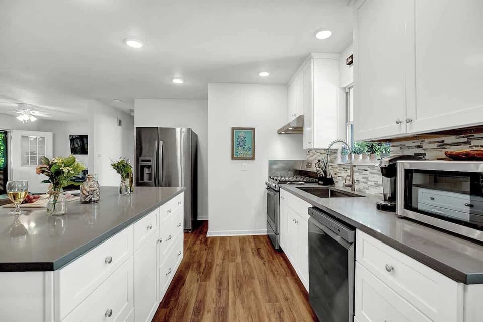 House, Multiple Beds, Patio (413 W Travis St) | Private kitchen | Coffee/tea maker