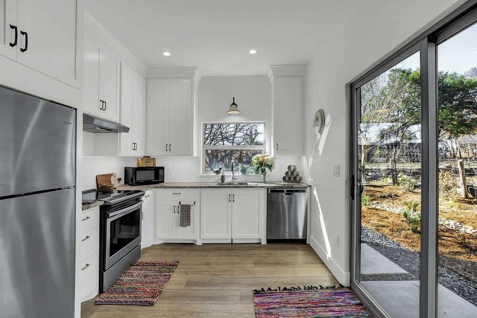 House, Multiple Beds, Patio, City View (403W Austin Carriage) | Private kitchen | Coffee/tea maker, electric kettle