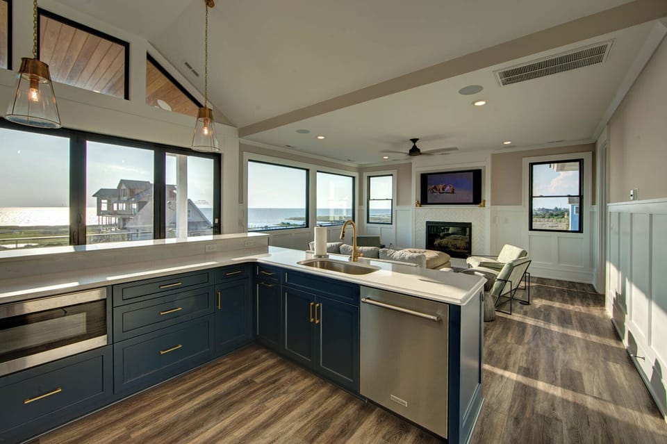 Kitchen opens to living area for all to enjoy!