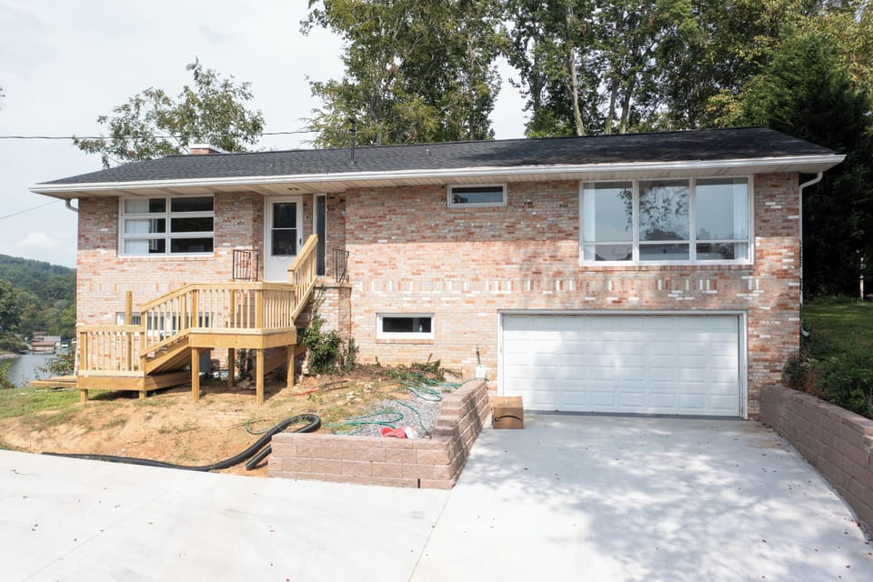 Front of house with plenty of parking. Currently landscaping front yard.