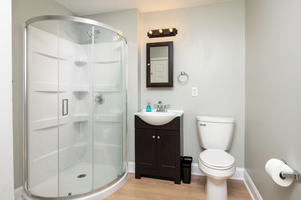 Downstairs bathroom with shower. 