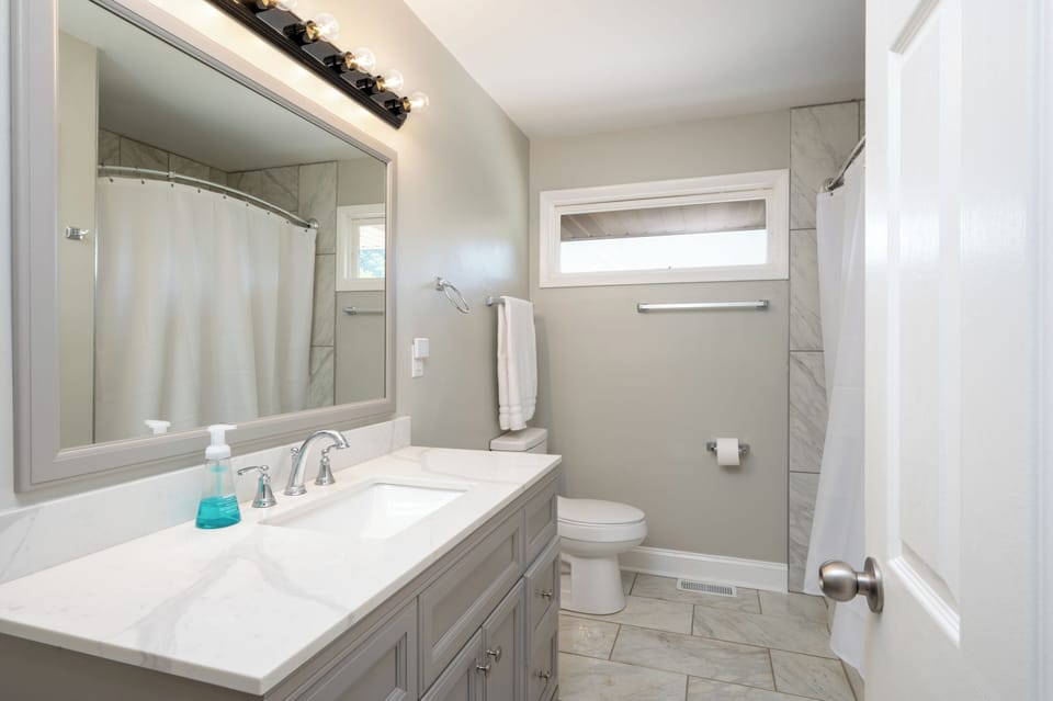 Guest bathroom with a tub and shower. 