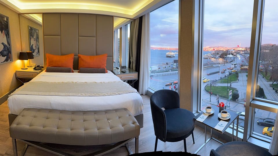Junior Suite, Partial Sea View | Minibar, in-room safe, desk, soundproofing