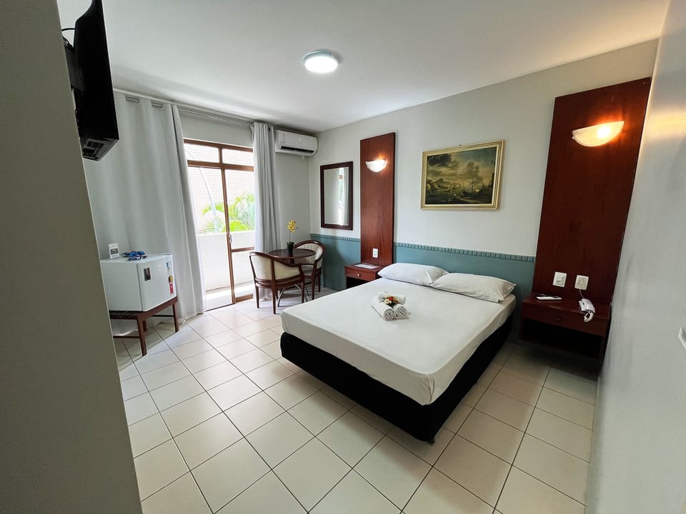Superior Double Room | Minibar, desk, laptop workspace, blackout drapes