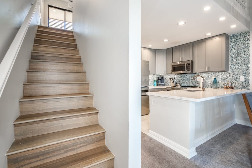 Luxury Condo | Private kitchen | Full-size fridge, microwave, oven, stovetop