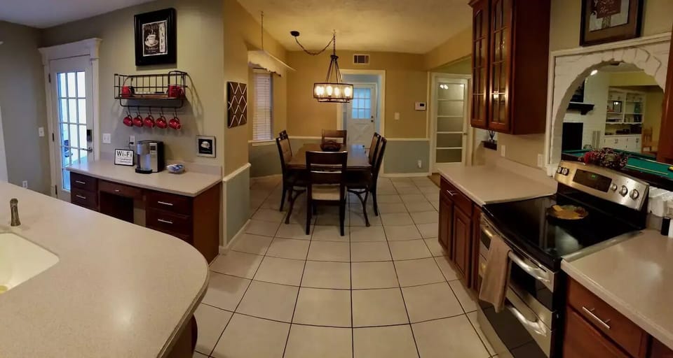 Dining room just off the kitchen for 6. There is another table for 4.