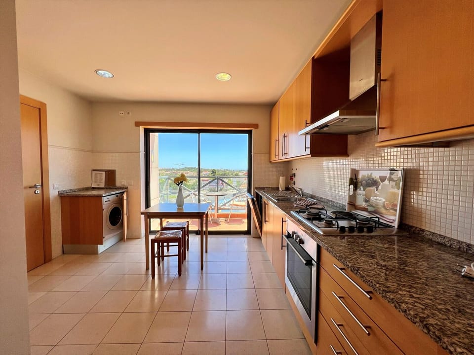 Apartment, 2 Bedrooms, Pool Access | Private kitchen | Coffee/tea maker, microwave, oven, dishwasher