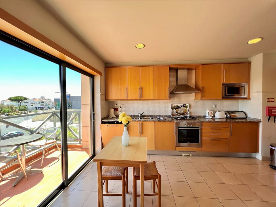 Apartment, 2 Bedrooms, Pool Access | Private kitchen | Coffee/tea maker, microwave, oven, dishwasher