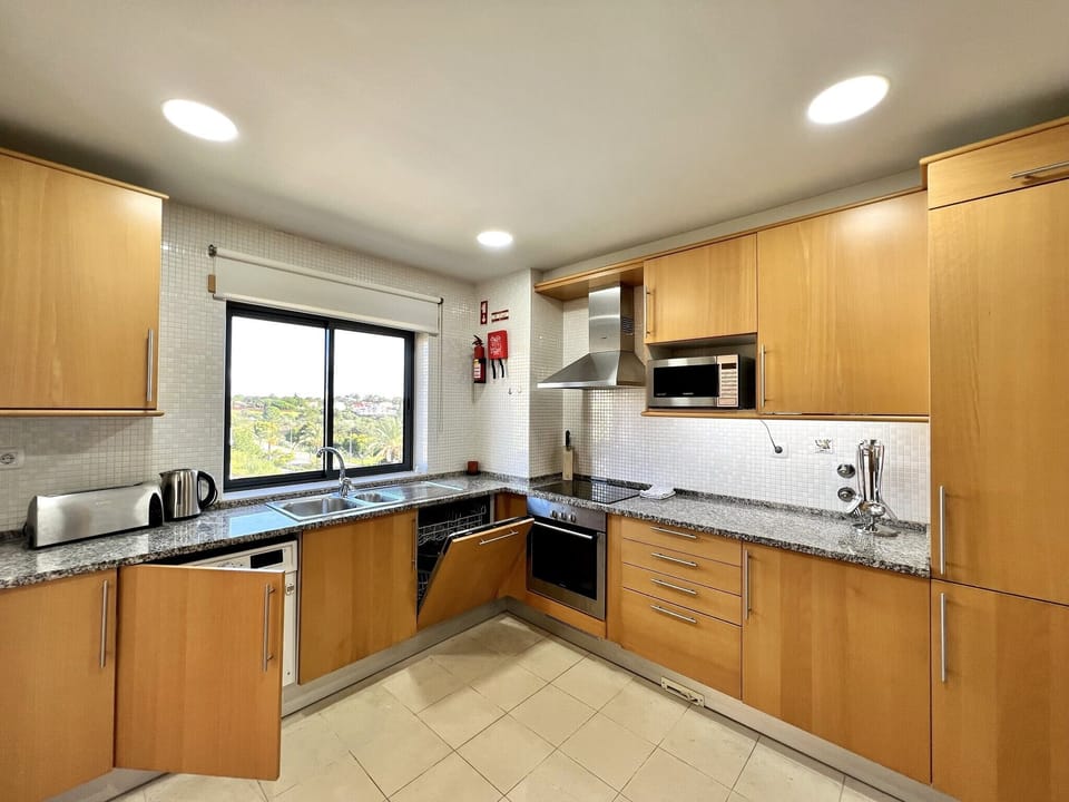 Apartment, 2 Bedrooms, Pool Access | Private kitchen | Microwave, oven, dishwasher, coffee/tea maker