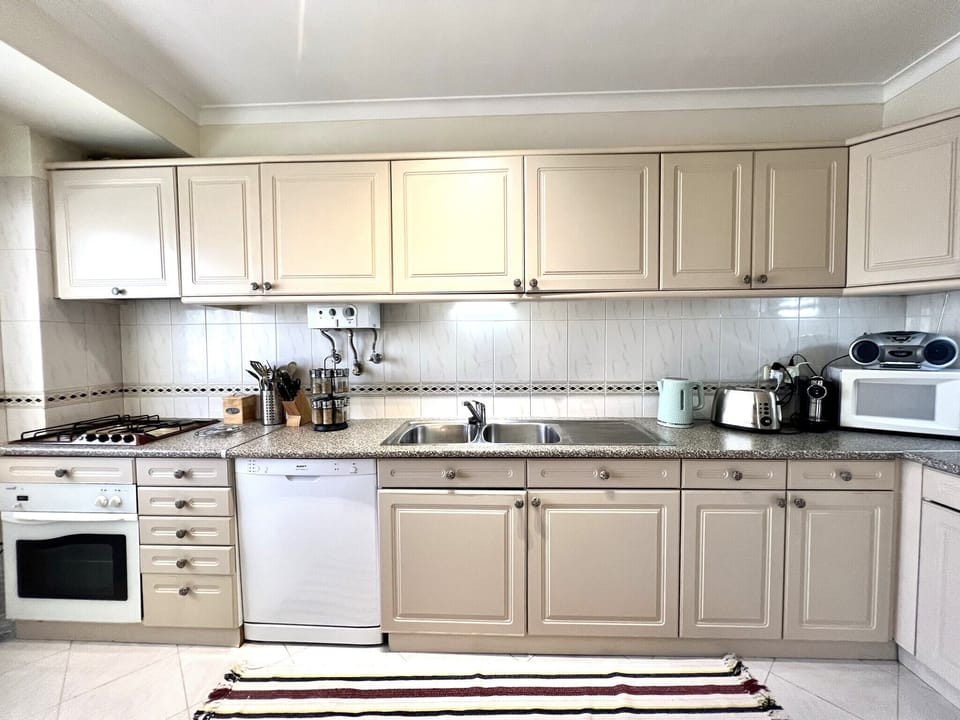 Apartment, 2 Bedrooms, Pool Access | Private kitchen | Coffee/tea maker, microwave, oven, dishwasher