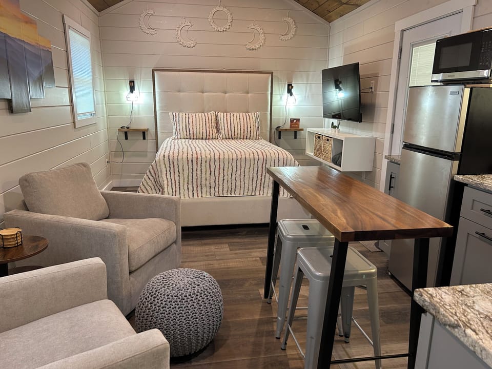Spacious Tiny Home with modern amenities. Hot Tub. Private backyard. Yard Games.
