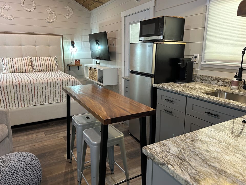 Dining Seating for 2 and Bistro Set in fenced backyard. Grill. Hot Tub. Modern.