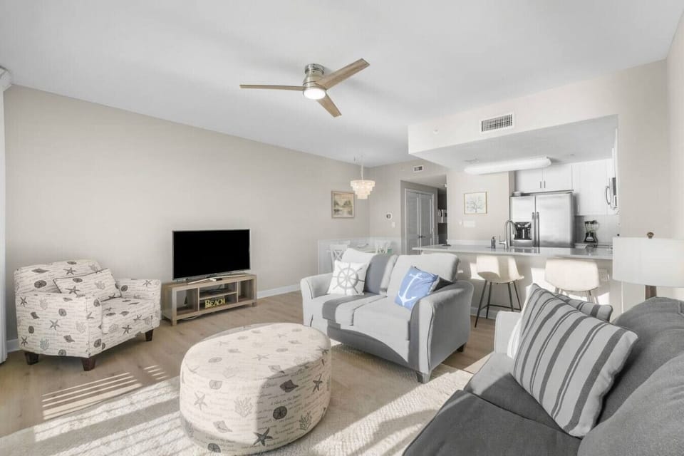 Living Area with Panoramic Ocean Views, Balcony Access, Sleeper Sofa and Flat Screen TV