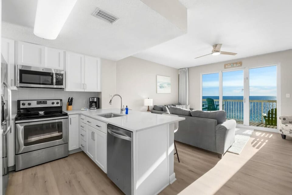 Fully Stocked Kitchen with Stainless Steel Appliances, High-Top Seating plus Dining Area with Seating