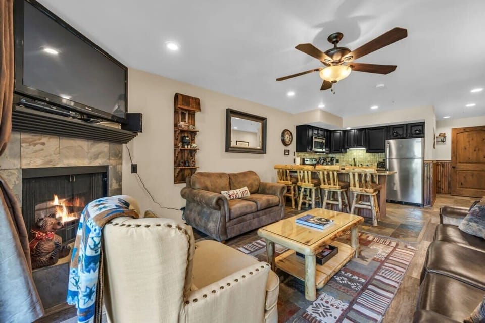 The main living space features an open layout with the kitchen and living room in one large space so your group can easily stay connected whether you are cooking or relaxing.