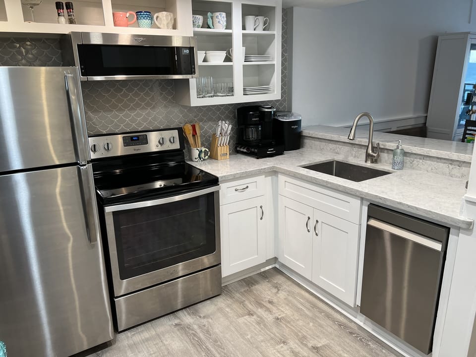 Well appointed kitchen for cooking or enjoying seaside meals.