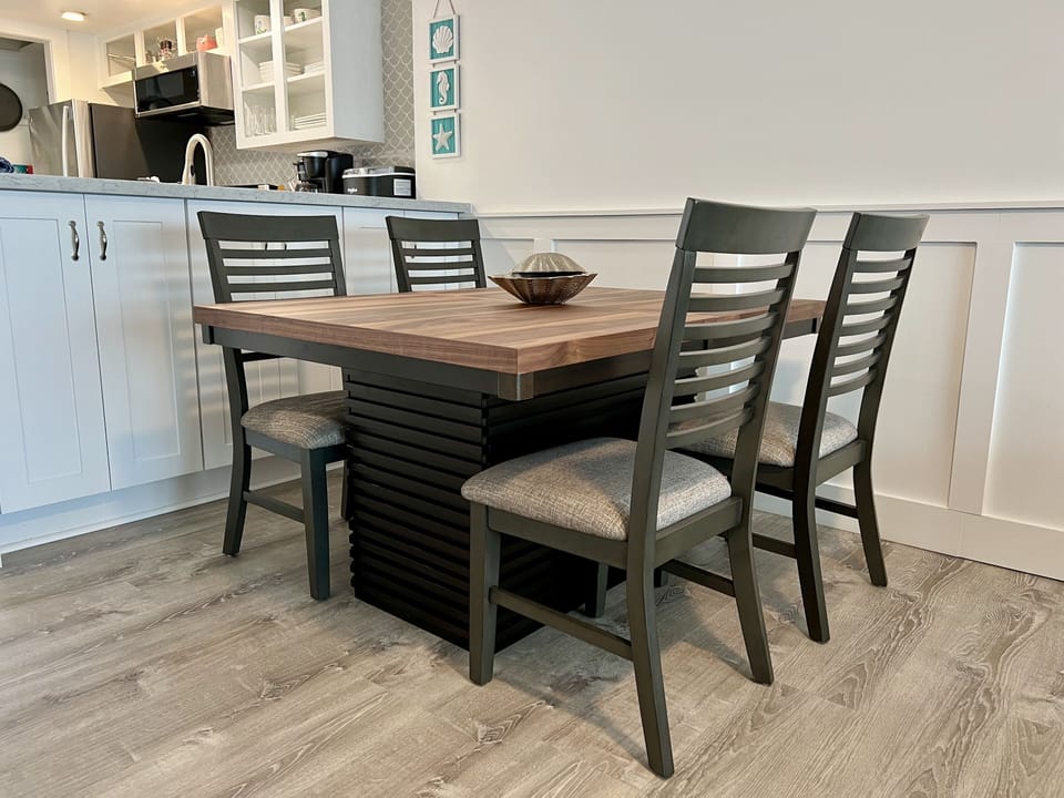 Dining table with comfortably accommodates meals in or entertaining friends