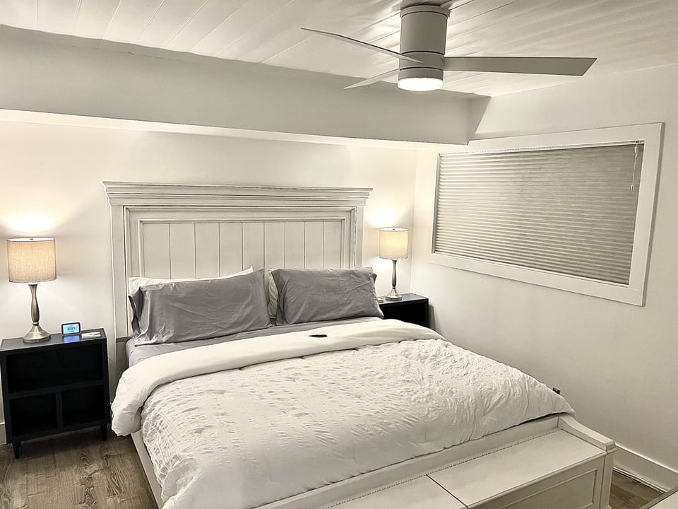 Master Bedroom with King Sized Bed and 50” Smart Television.