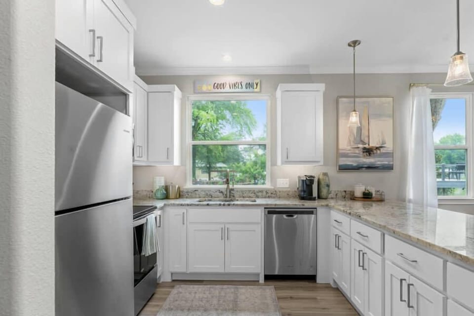 Stocked kitchen with lots of counter space.