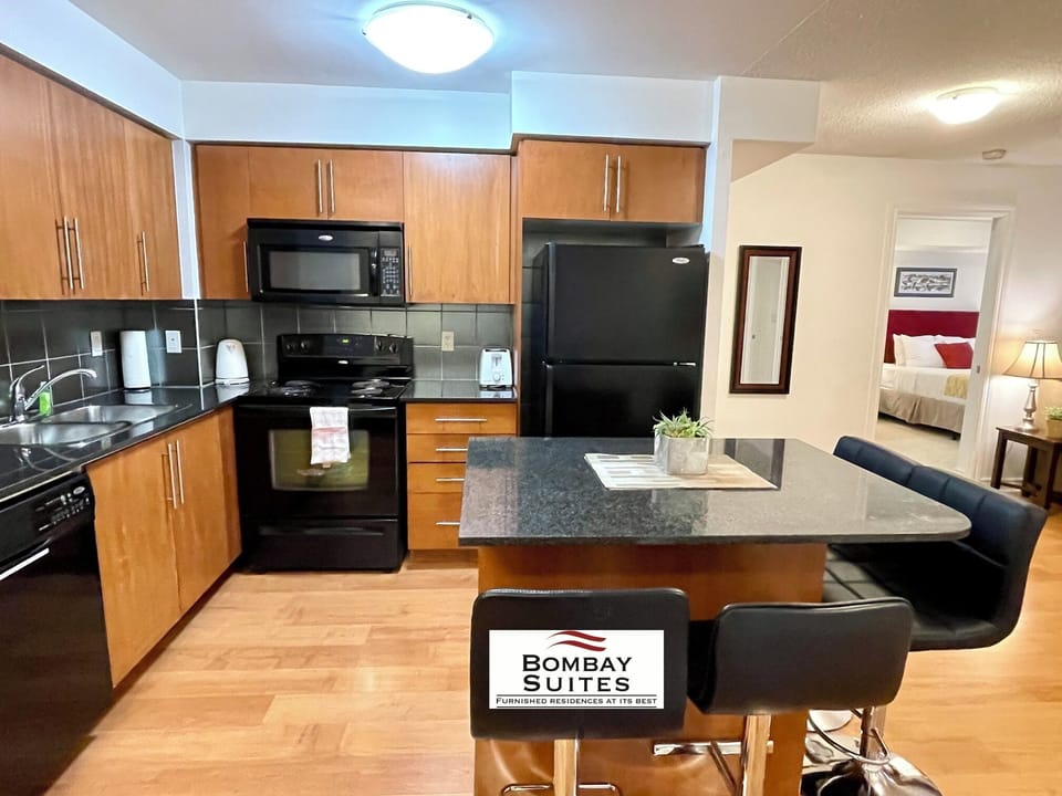 Executive Suite, 2 Bedrooms | Private kitchen | Full-size fridge, microwave, oven, stovetop