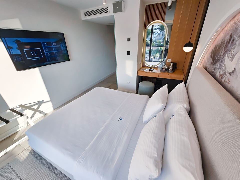 Premium bedding, memory foam beds, in-room safe, desk