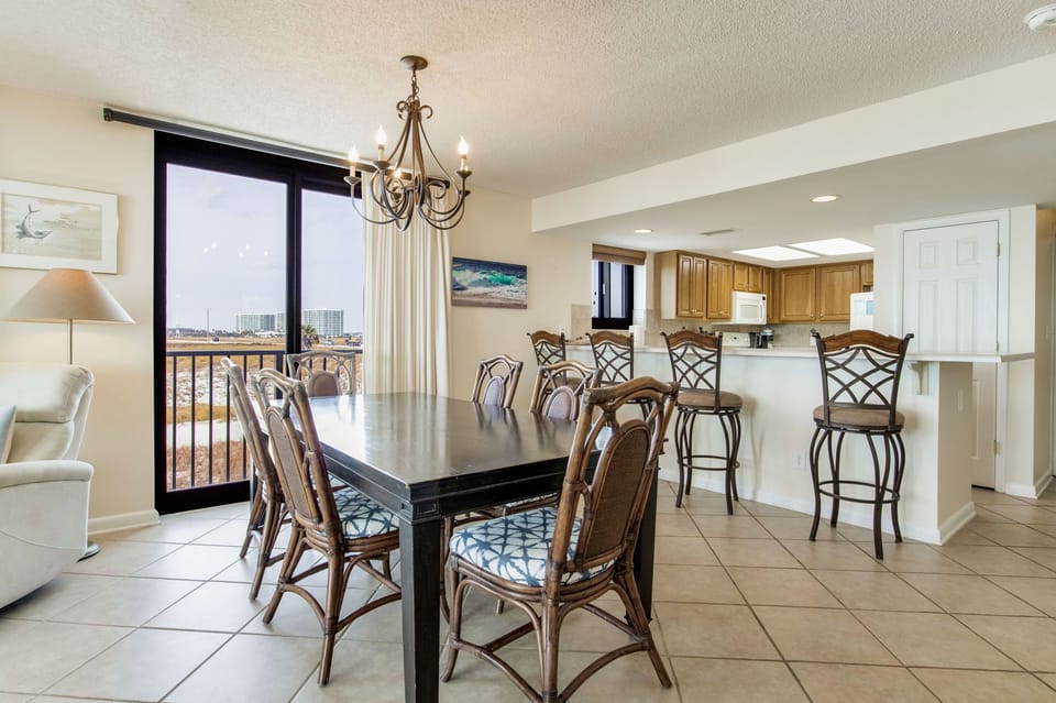 Bright living and dining areas with Gulf views throughout at Wind Drift 112 SW Orange Beach beachfront property