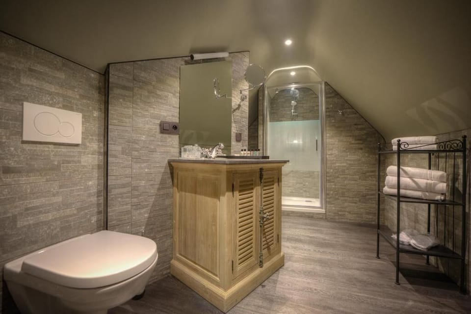 Luxury Room | Bathroom | Designer toiletries, hair dryer, bathrobes, slippers