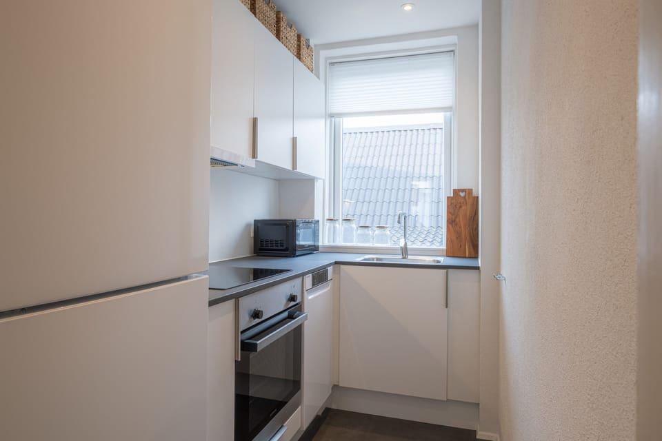 Apartment | Private kitchen | Fridge, microwave, oven, stovetop