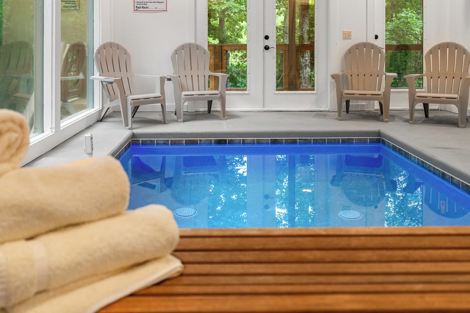 Bathroom & pool towels provided. Pool room leads to the lower deck with hot tub.