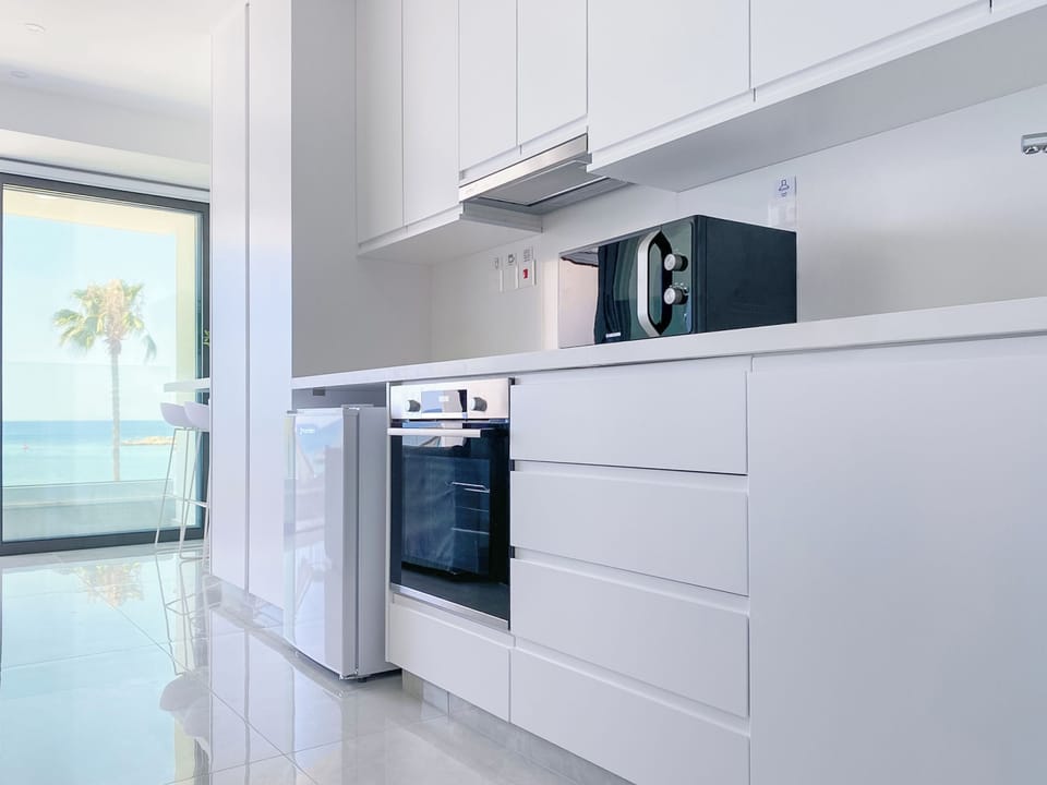 Luxury Apartment | Private kitchen | Full-size fridge, microwave, oven, stovetop