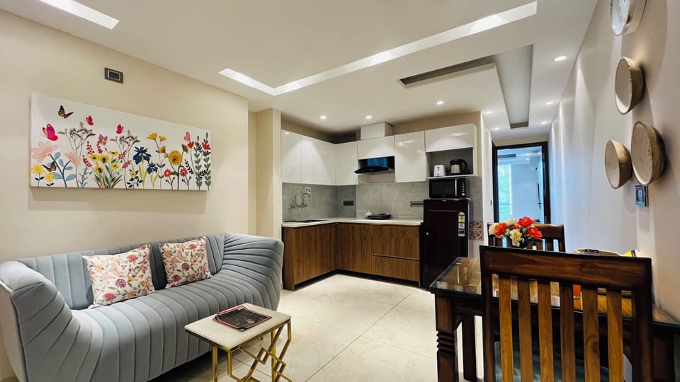 Junior Suite with Balcony | Living area | 36-inch Smart TV with digital channels, TV, Netflix