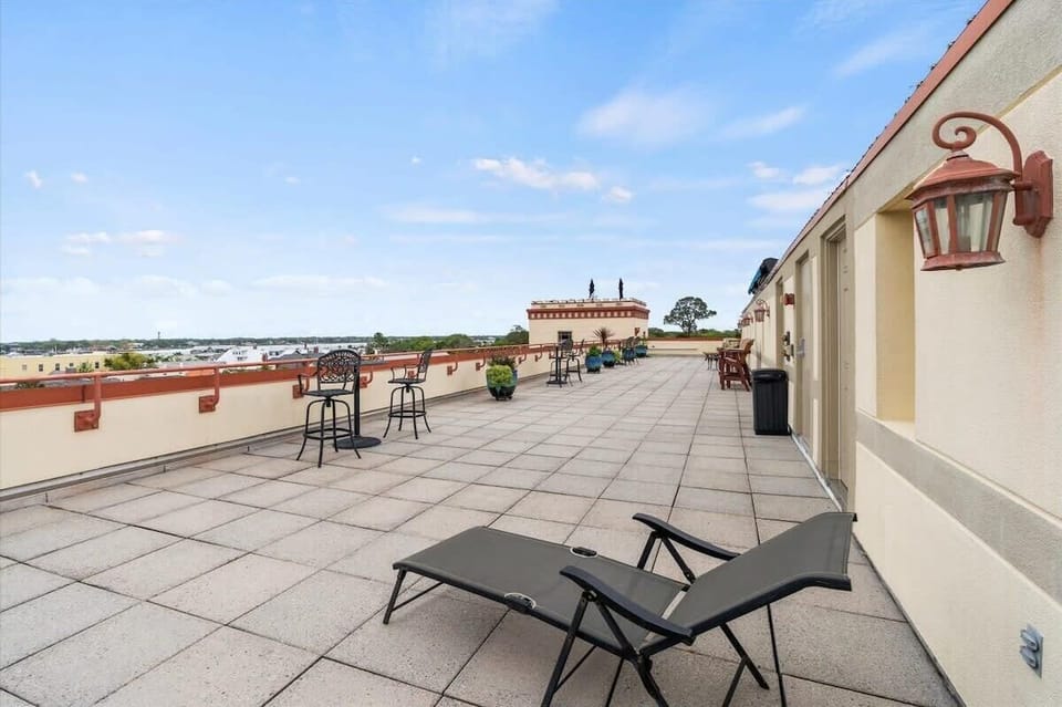 An awesome rooftop terrace with outdoor seating to enjoy city & bay views.
