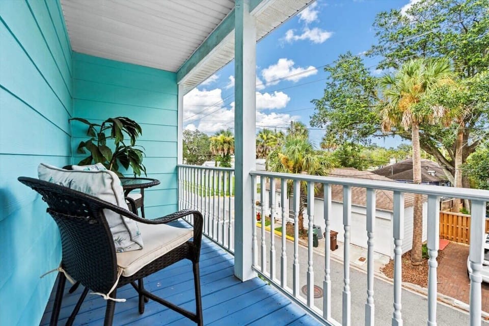 Private porch seating with neighborhood views and fresh air.
