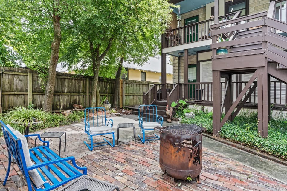 Relax in your private garden courtyard with comfy seating and BBQ grill.