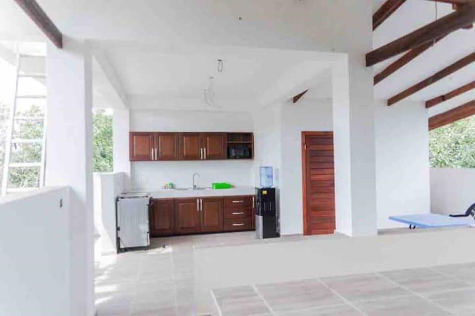 A full kitchen in the roof top terrace. You can cook, or we cook for you.