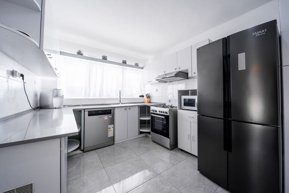 Apartment | Private kitchen | Full-size fridge, microwave, oven, stovetop