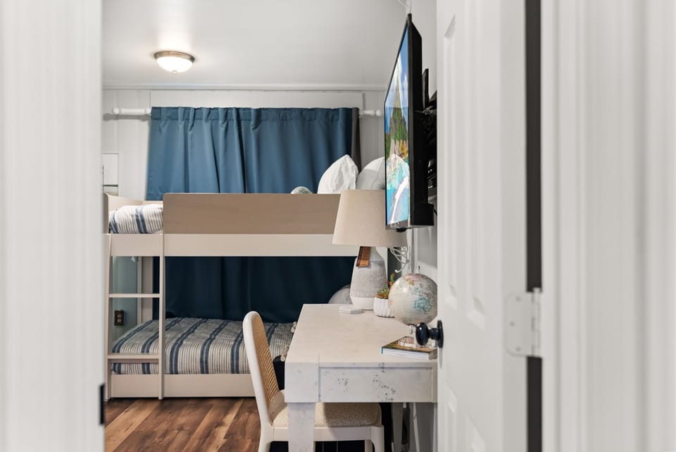 Bedroom #2 - Queen bed, twin bunk bed, 45" flat screen TV, workspace 