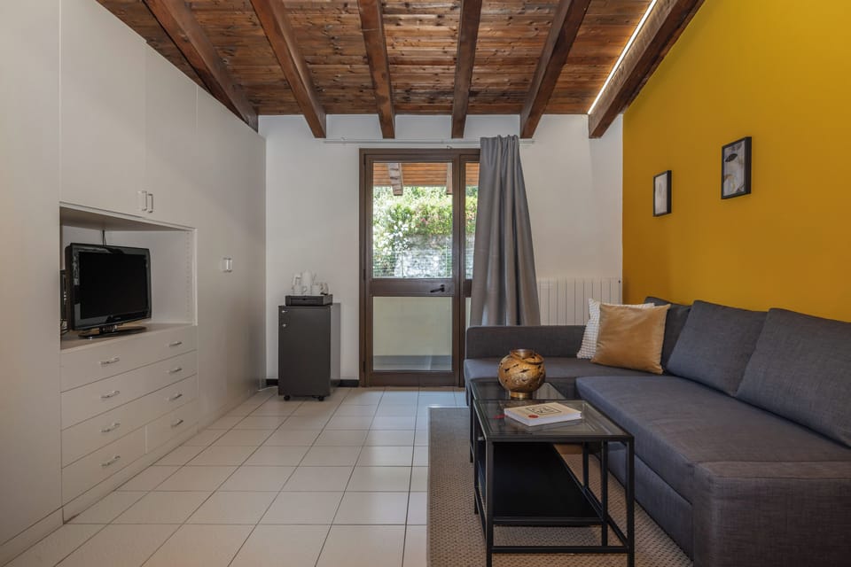 Spaziosa | Living area | 24-inch LCD TV with satellite channels, TV