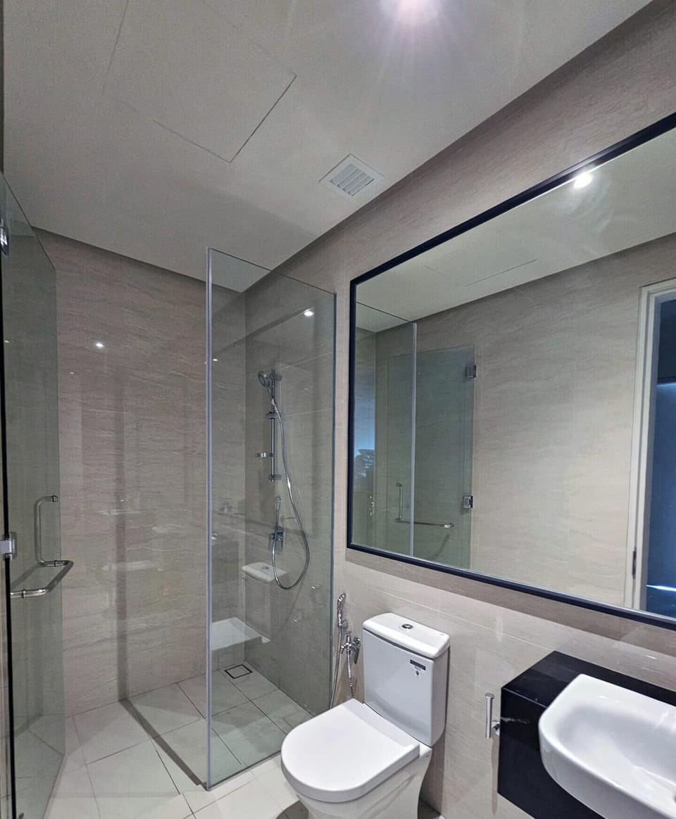 Guest bathroom with head shower (hot & cold water available)