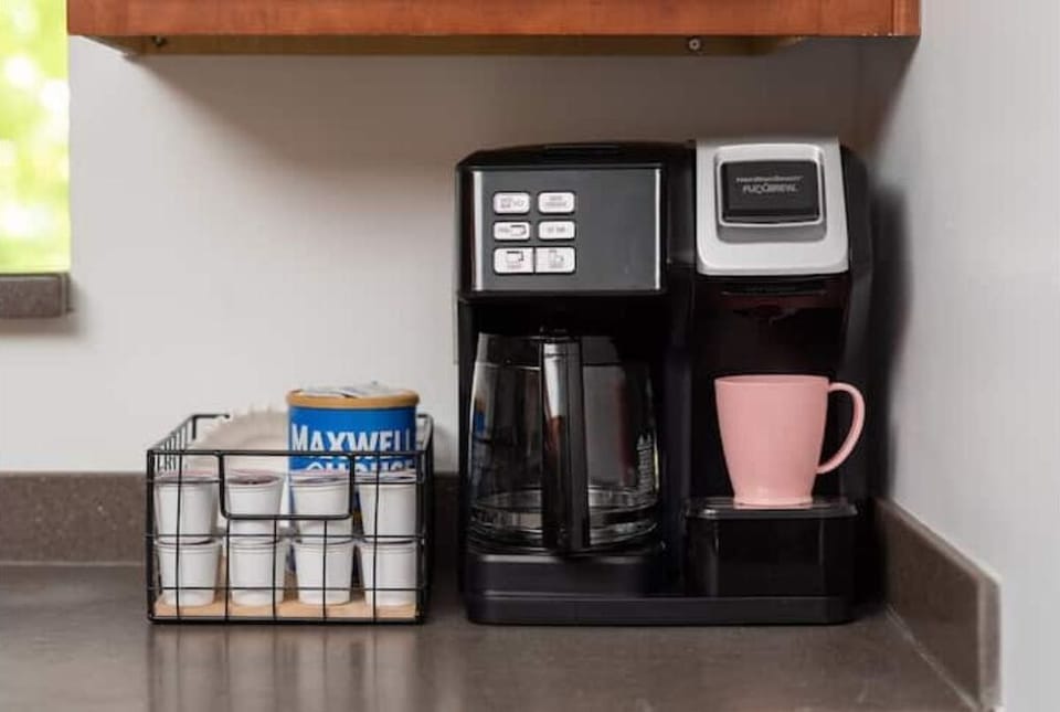 Includes a coffee pot with a Keurig. 