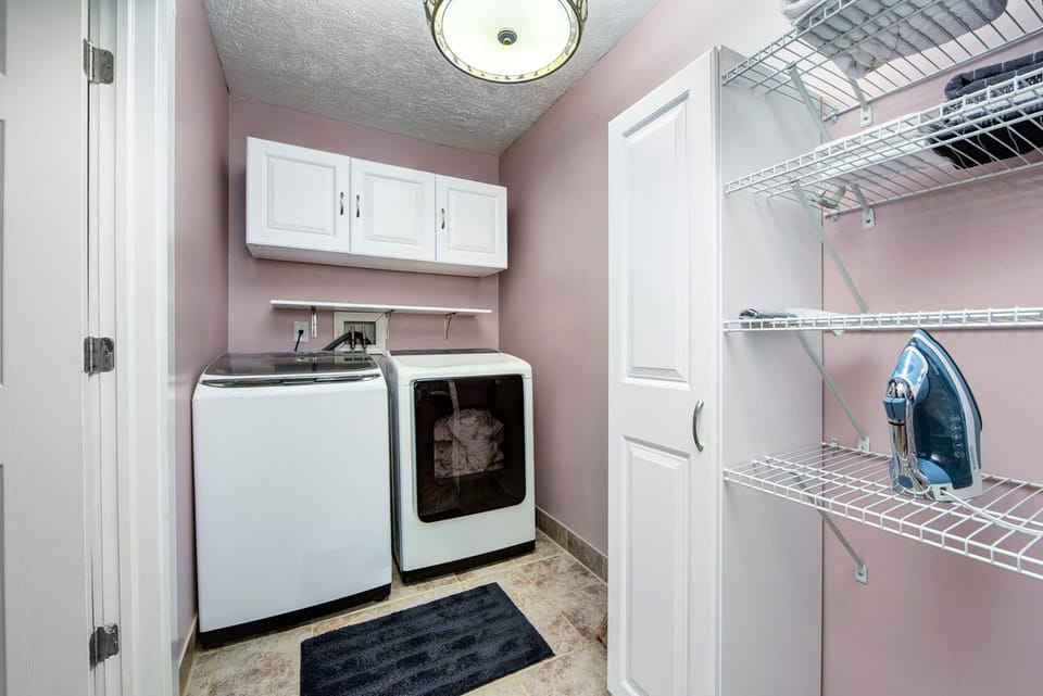 Laundry room attached to kitchen.