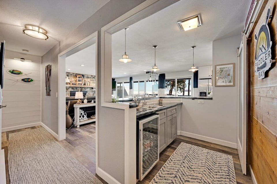 Enjoy a cocktail and game of bar dice at the wet bar