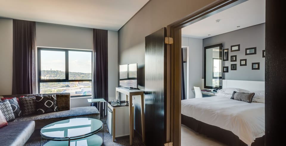 Executive Suite, 1 Bedroom | Minibar, in-room safe, individually decorated, individually furnished