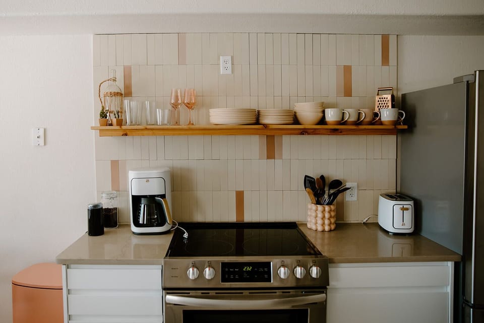 Our kitchen has everything you need, including fresh coffee beans and grinder.