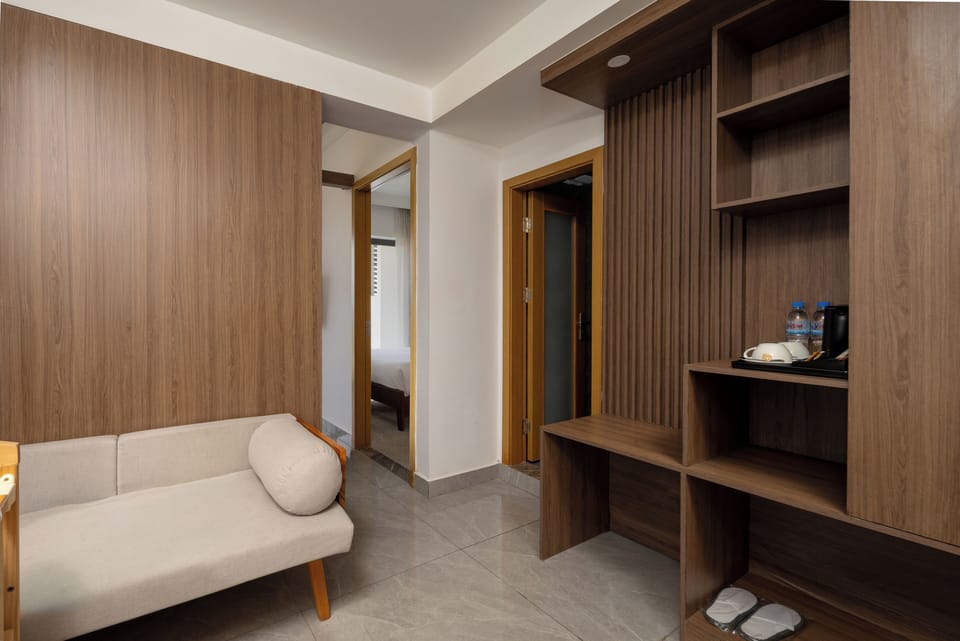 Family Suite, River View | Living area | Flat-screen TV