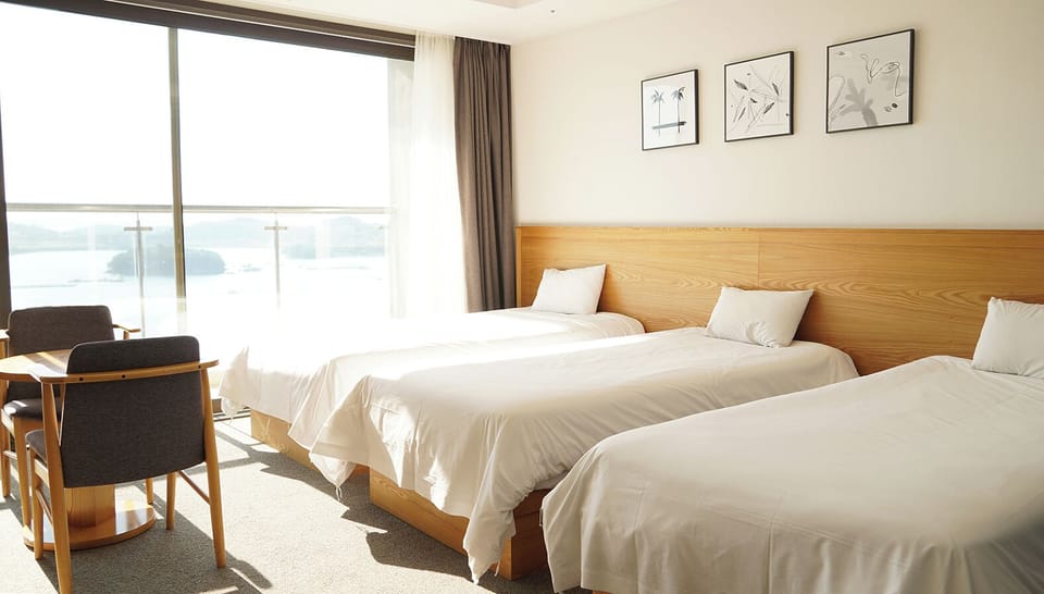Triple Room, Non Smoking, Ocean View | Desk, laptop workspace, free WiFi, bed sheets