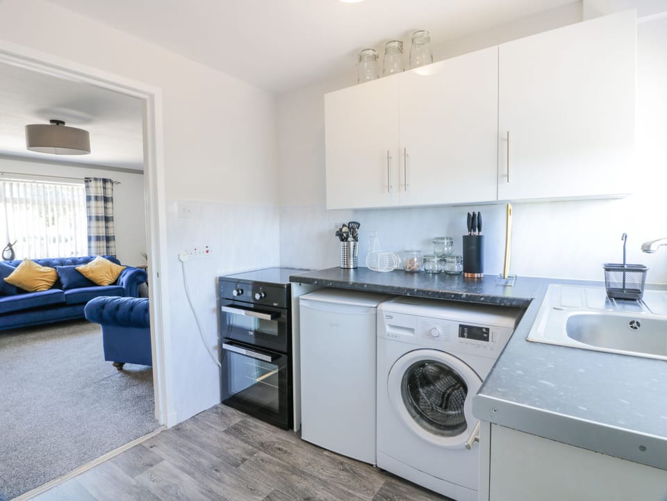 Fridge, electric kettle, toaster, cookware/dishes/utensils