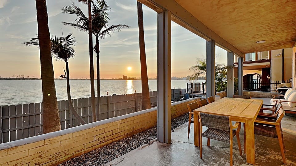 Private Bayfront Backyard with Large Table for enjoying the sunset with a fresh meal
